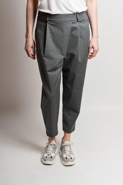 Pantaloni asimmetrici a pieghe Margret